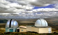 Mount John University Observatory.Lake Tekapo.NZMount John University Observatory (MJUO), is New Zealand's premier astronomical research observatory. It is situated at 1,029 metres (3,376 ft) ASL atop Mount John at the northern end of the Mackenzie Basin in the South Island, and was established in 1965 There are many telescopes on site including: one 0.4m, two 0.6m, one 1.0m, and a new 1.8m 'MOA Telescope' (see below) The nearest population center is the resort town Lake Tekapo (pop. 