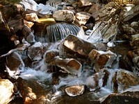 Water freezes on rocks along Ostler Fork Creek below Amethyst Lake, Uinta-Wasatch-Cache National Forest. Original public domain image from Flickr