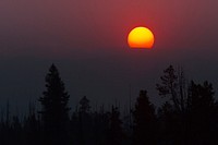 Smoke colors the sunrise over the Beartooth Plateau. Original public domain image from Flickr