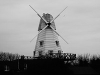 Old windmill in countryside. Free public domain CC0 image.