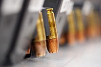 Magazines of 9mm ammunition are lines up on a table at the 673d Security Forces Squadron armory before issue to security forces Airmen, and military police Soldiers assuming their duty and patrol shifts on Joint Base Elmendorf-Richardson, Alaska, Dec. 14, 2016. Armory Airmen ensure weapons and equipment. Security forces is the largest career field in the U.S. Air Force, and the base armory Airmen ensure the joint team protecting JBER has the tools it needs to maintain its security and safety. (U.S. Air Force photo by Justin Connaher). Original public domain image from Flickr