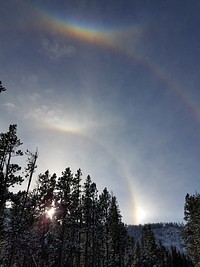 22 degree halo with sun dog seen from road above Mammoth Terraces. Original public domain image from Flickr