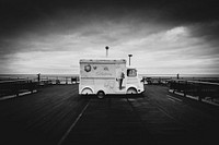 Ice cream truck parked on alone, black and white tone in Southport. Original public domain image from Flickr