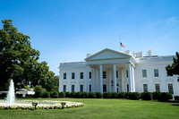 The United States Flag Flies at Half-Staff Atop the White House, honoring the memory and historic public service of civil rights leader Rep. John Lewis of Georgia, who died Friday in Atlanta. Original public domain image from Flickr