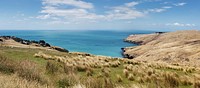 Banks Peninsula is a peninsula of volcanic origin on the east coast of the South Island of New Zealand. It has an area of approximately 1,150 square kilometres and encompasses two large harbours and many smaller bays and coves. The South Island's largest city, Christchurch, is immediately north of the peninsula. Original public domain image from Flickr