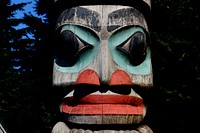 Totem poles and masks. Original public domain image from Flickr