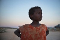 A girl stands in an IDP camp on the outskirts of Belet Weyne on February 20. Original public domain image from Flickr