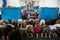 Men pray at a mosque in Mogadishu, Somalia, during the holy month of Ramadan. Original public domain image from Flickr