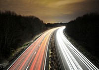 Car taillight long exposure. Free public domain CC0 photo.