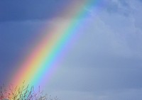 Rainbow in cloudy sky. Free public domain CC0 image.