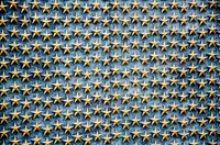 Golden star pattern on blue background. Free public domain CC0 photo.