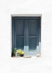 Flowers by wooden window.  Free public domain CC0 image.