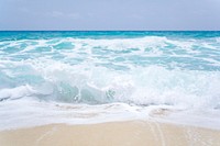 Foamy ocean beach sandy shore free public domain CC0 photo.