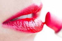 Woman wearing red lipstick close up view, free public domain CC0 photo.