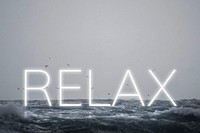 White neon text RELAX typography