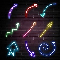 Neon arrows sign set on brick wall