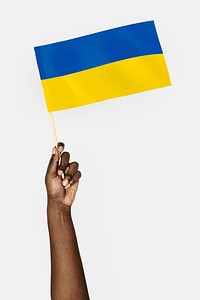 Ukraine's flag in black hand collage element, isolated hand & object psd