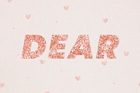 Glittery dear typography on heart patterned background