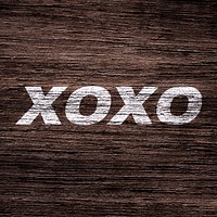 XOXO printed word coarse wood texture