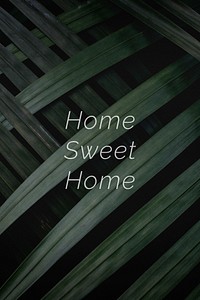 Home sweet home quote on a palm leaves background