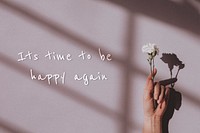 It&#39;s time to be happy again quote on a natural light background