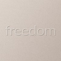 Freedom embossed text on white paper background