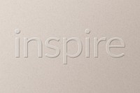 Inspire embossed text white paper background