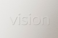Vision embossed text white paper background