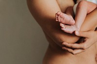 Mother holding her baby background