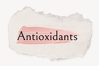 Antioxidants word, ripped paper, pink marker stroke typography