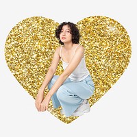 Woman sitting, gold glitter heart shape badge