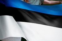 Person holding Estonia flag background, national symbol