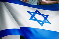 Person holding Israel flag background, national symbol