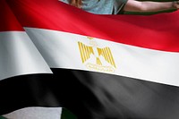 Person holding Egyptian flag background, national symbol