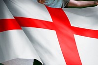 Person waving Saint George's Cross flag, national symbol