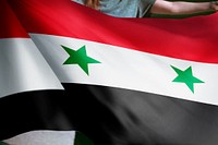 Person holding Syria flag background, national symbol