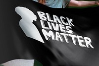 Person holding Black Lives Matter flag background