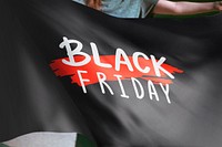 Person holding black Friday sale flag