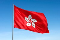 Waving Hong Kong flag, national symbol, blue sky