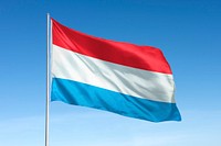 Waving Luxembourg flag, national symbol, blue sky