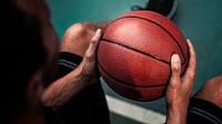 Man holding his basketball wallpaper