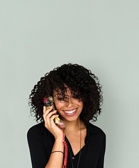 African descent woman talking by phone