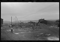 [Mount Carmel,] Pennsylvania. Church spires and houses seen over coalyards on the outskirts of town. Sourced from the Library of Congress.