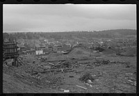 [Mount Carmel,] Pennsylvania.  A birds-eye view of one end of the town, showing coalyards, and fields on the outskirts and tree-covered hills in the background. Sourced from the Library of Congress.