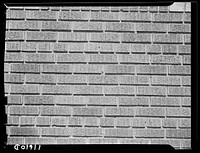Texture background for motion picture and filmstrip. Brick wall. Sourced from the Library of Congress.