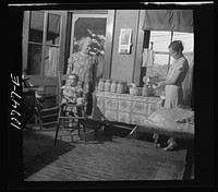 Canning beans in farm kitchen near Bristol, Vermont. Sourced from the Library of Congress.