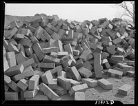Washington, D.C. Construction of temporary war emergency buildings on the Mall, near 16th and 17th Streets, N.W. Pile of bricks. Sourced from the Library of Congress.