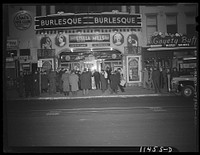 Washington, D.C. In front of the Gayety burlesque theater at night. Sourced from the Library of Congress.