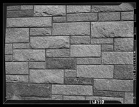 Texture background for motion picture and filmstrip titles. Stone wall. Sourced from the Library of Congress.