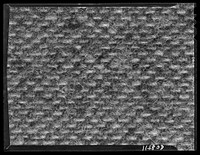 Texture background for motion picture and filmstrip titles. Wool fabric. Sourced from the Library of Congress.